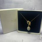 Collier Ovale Doré – Béton & Or Une Lueur de Bonheur